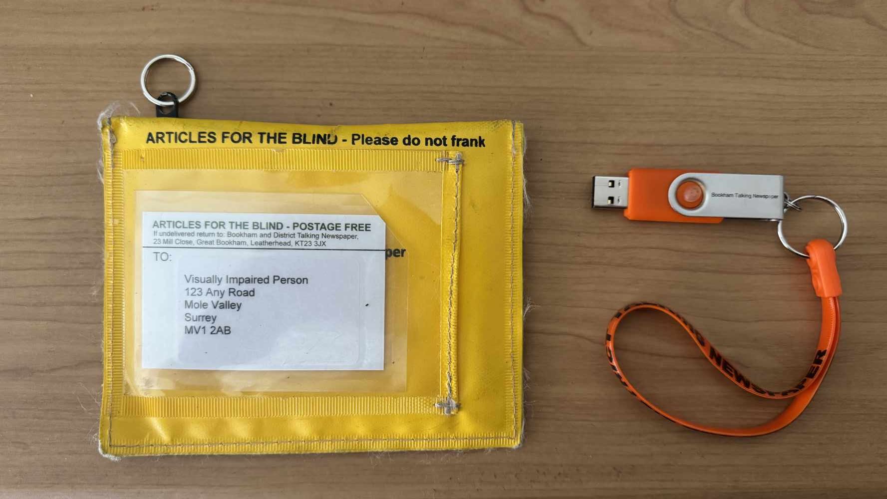 articles for the blind postal wallet with Bookham Talking News USB memory stick